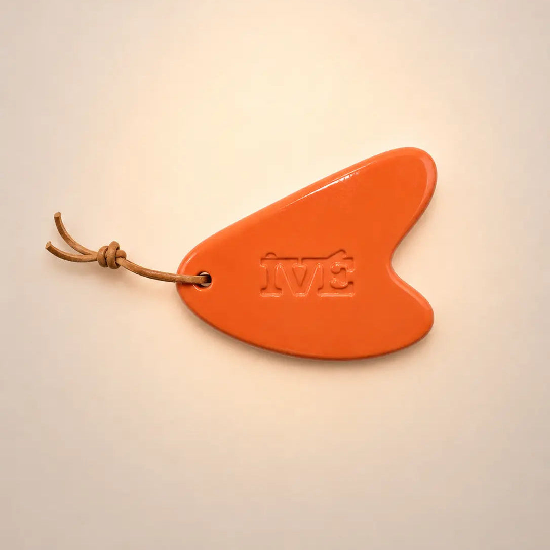 Gua sha orange fond beige