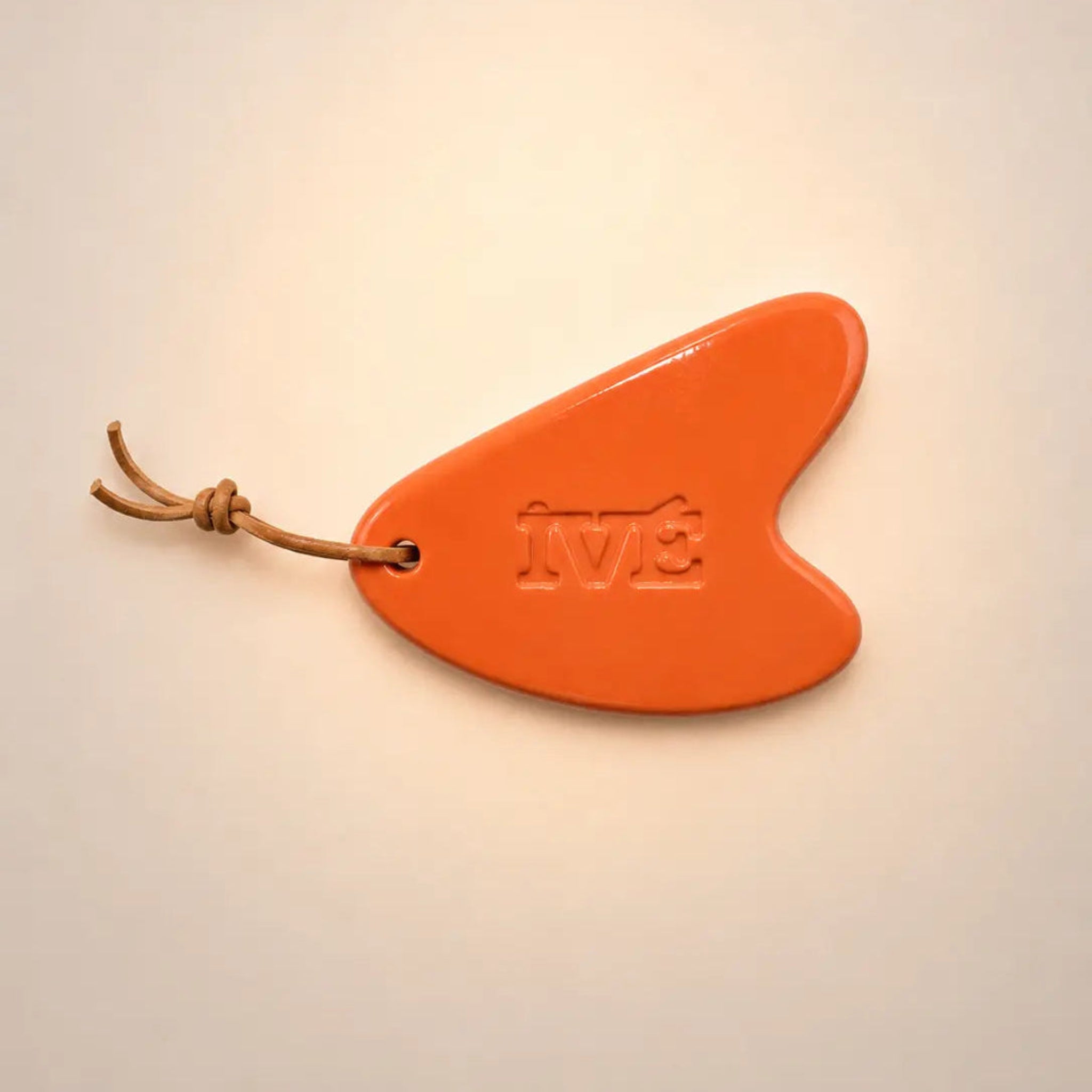 Gua sha orange fond beige