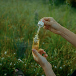 Photo de la pipette et du flacon dans un champ